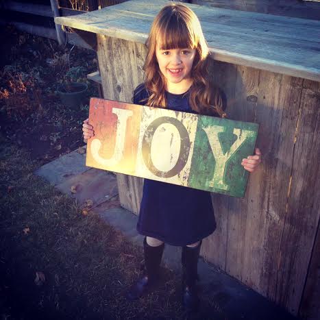 jenna holding joy sign